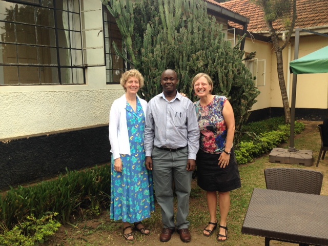 Caption: Liz Boyle and Ann Meier with Dean of Social Sciences Andrew State, Makerere University (photo by Matt Sobek).